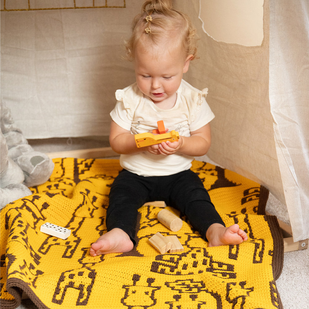 Giraffe — gemaakt met High & Mighty Babydeken Garen & Haakpakket