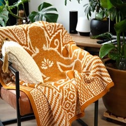 Beaming Buddha Decke Garnpaket en Häkelpaket