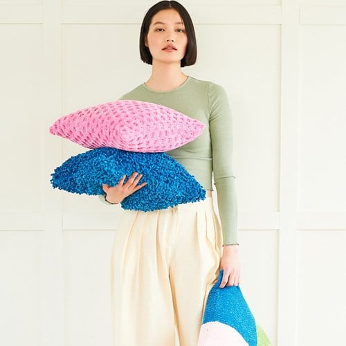 Stylecraft-Strickanleitung „Squeeze Me Cushions“.